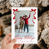 Rode vakantiehand getrokken grillige strikken feestdagenkaart