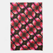 Rode ventilator in zonlicht sluit patroon op theedoek (Verticaal)