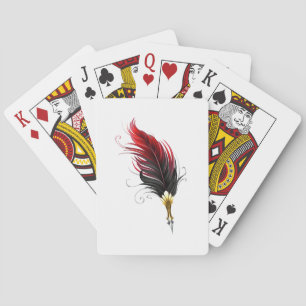 Rode veren pen met gouden penpunt pokerkaarten