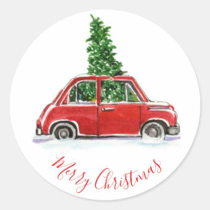 Rode vintage auto met kerstboom ronde sticker