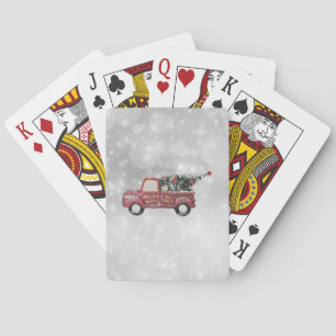 rode vintage vrachtwagen op een grijze bokeh achte pokerkaarten