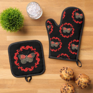 Rode vlinder in een cirkel van vuur - symbool van  ovenwant & pannenlap set