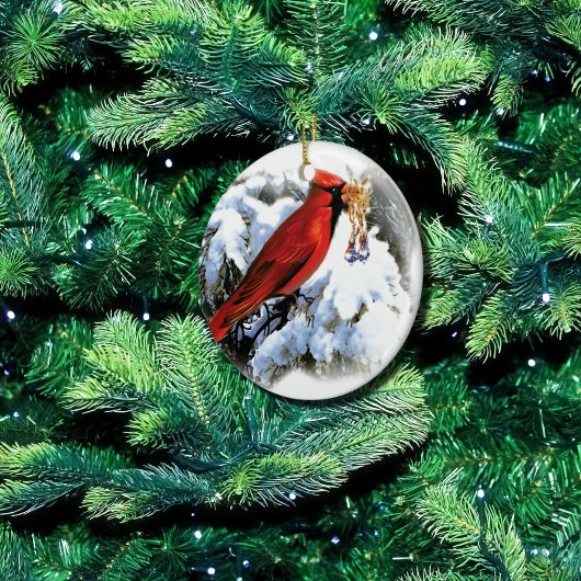 rode vogel in sneeuw keramisch ornament