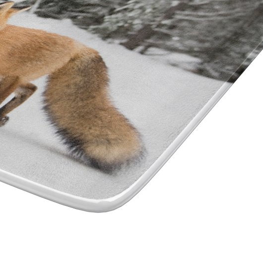 Rode vos in witte sneeuw snijplank (Hoek)