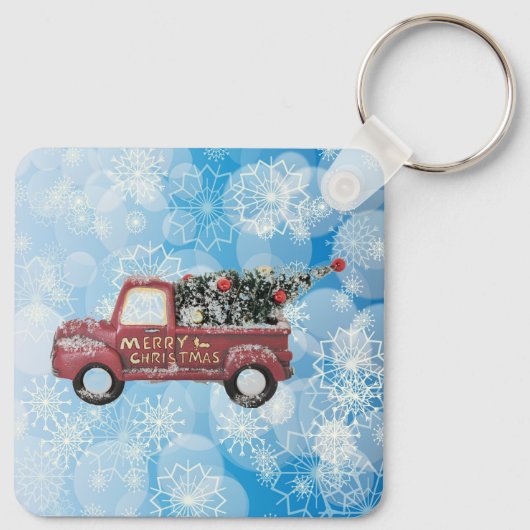 rode  vrachtwagen op een blauwe sneeuwvlok sleutelhanger (Achterkant)