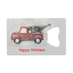 rode  vrachtwagen op een grijze achtergrond creditkaart flessenopener