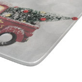 rode vrachtwagen op een grijze achtergrond snijplank (Hoek)