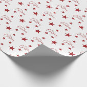Rode vrolijke kerststerren cadeaupapier (Hoek)