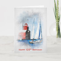 Rode vuurtoren en zeilboot 69e verjaardag
