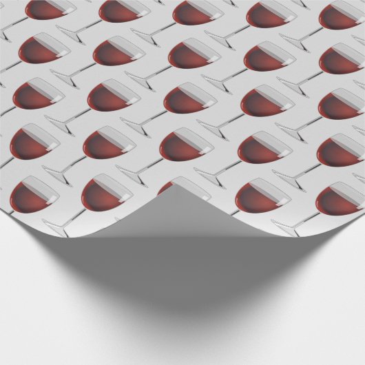 rode wijnbril op grijs cadeaupapier (Hoek)