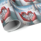 Rode winterhandschoenen met wintertekst cadeaupapier (Rol Hoek)