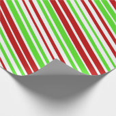 Rode, witte en groene kerststrepen cadeaupapier (Hoek)