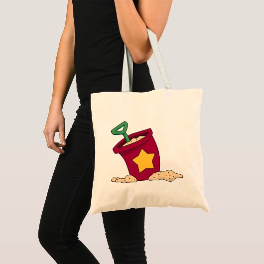 Rode zandemmer met ster en schep tote bag