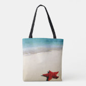 Rode zeester op witte zandband tote bag (Achterkant)