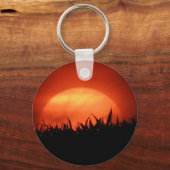 Rode zonsondergang achter zwart gras sleutelhanger (Voorkant)