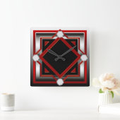 Rode zwarte en zilverkleurige wandklok (Huis)