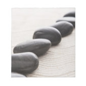 Rokken op zand notitieblok (Voorkant)