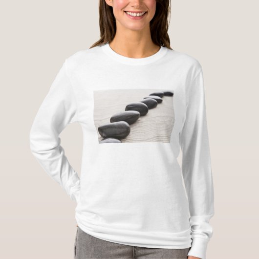 Rokken op zand t-shirt (Voorkant)