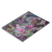 Rol kleurige gloed werkt wit muzieknot notitieboek (Linkerzijde)