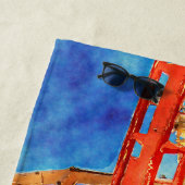 Roller onderzetter op het strand strandlaken (In situ)