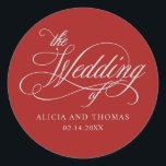 Romantic Red Wedding met kalligrafie Ronde Sticker<br><div class="desc">Deze klassieke sticker van de rode bruiloft is prachtig romantisch en heeft een mooie tekst van het calligrafische script in het zilver met een sjabloon voor het opnemen van de bruid- en bruidnaam en de trouwdatum. Het maakt een mooie keuze voor trouwfeesten, cadeaus of andere objecten die je voor je...</div>