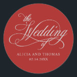 Romantic Red Wedding met kalligrafie Ronde Sticker<br><div class="desc">Deze klassieke sticker van de rode bruiloft is prachtig romantisch en heeft een mooie tekst van het calligrafische script in het zilver met een sjabloon voor het opnemen van de bruid- en bruidnaam en de trouwdatum. Het maakt een mooie keuze voor trouwfeesten, cadeaus of andere objecten die je voor je...</div>