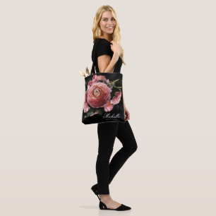 Romantisch roze bloemenboeket op zwart tote bag
