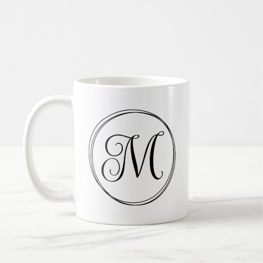 Rond krullend scriptmonogram koffiemok (Links)