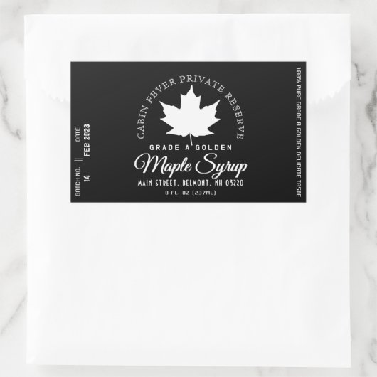 Rond logo op etiket van esdoornsiroop (batch en da (Tas)