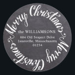 Rond Merry Christmas Chalkboard adreslabel Ronde Sticker<br><div class="desc">Voeg dit ronde adreslabel toe aan de achterkant van uw kerstkaartweergave en het zal verdubbelen als een envelopzegel. De zwarte krijtbordachtergrond zal er geweldig uitzien op elke kleurenvelop. Merry Christmas is geschreven in een helder wit script lettertype. Uw familienaam en adres staan op de achterkant. in een klassiek serif lettertype....</div>