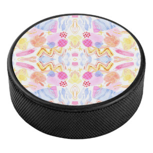 Rond voorwerp met een kleurrijk abstract patroon hockey puck