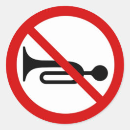 Ronde sticker met hoorn verboden teken.