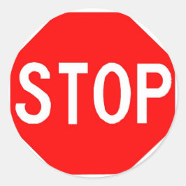 Ronde sticker met stopteken.