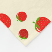 Rood aardbeienpatroon op bleek roze fleece deken (Hoek)