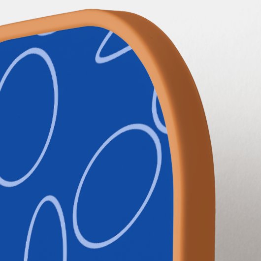 Rood Bi-vlak Blauwe Cirkels Lussen Pickleball Paddle (Links Detail)