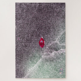 Rood blad met gespikkeld zand legpuzzel