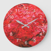 Rood blad overal op grote klok (Voorkant)