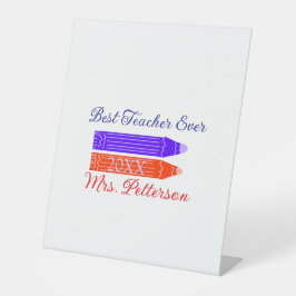 Rood blauwe kleurpotloden beste leraar ooit jaarna reclamebord met voetstuk