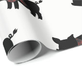 Rood buffelvarken met scharf cadeaupapier (Rol Hoek)