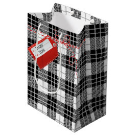Rood cadeautje Label op Tartanje geplakt met een g Medium Cadeauzakje