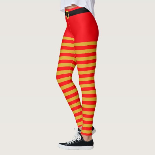 Rood- en goudkerst met gestreept leggings (Links)