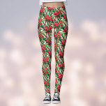 Rood en Groen Kerstmis Holly Patroon Leggings<br><div class="desc">Dit feestelijke patroon is voorzien van rode hulstbessen en groen gebladerte tegen een donkergroene achtergrond. Dek de zalen,  voeg wat plezier toe aan je oefening,  of doe boodschappen in stijl met deze leuke kleurrijke leggings.</div>