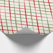 Rood en groen snijdsel op crème cadeaupapier (Hoek)