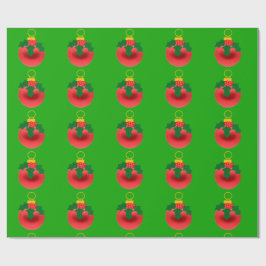 Rood en Holly Ornament op groen inpakpapier