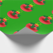 Rood en Holly Ornament op groen inpakpapier (Hoek)