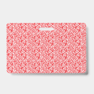 Rood en oranje inpakpapier met een geometrisch mot badge