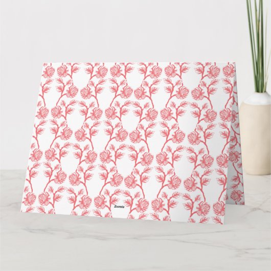 Rood en roze inpakpapier met een herhalende kaart (Achterkant)