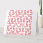 Rood en roze inpakpapier met een herhalende kaart (Voorkant)