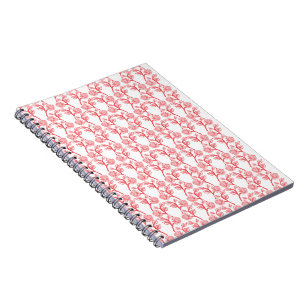 Rood en roze inpakpapier met een herhalende notitieboek