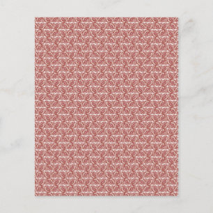Rood en roze textiel gelegd over een pattereerde t flyer